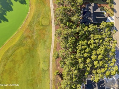 Enjoy spectacular panoramic golf and pond views of the 17th on Reserve Club At St James Plantation in North Carolina - for sale on GolfHomes.com, golf home, golf lot