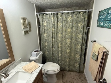 **Pro pics coming soon* This nicely updated, villa-style condo on The Dunedin Country Club in Florida - for sale on GolfHomes.com, golf home, golf lot