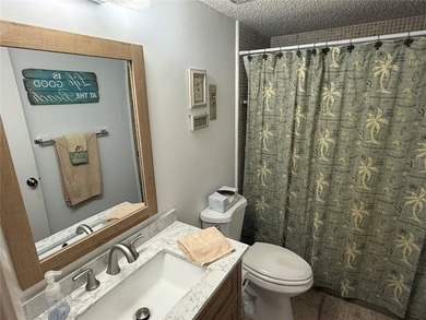 **Pro pics coming soon* This nicely updated, villa-style condo on The Dunedin Country Club in Florida - for sale on GolfHomes.com, golf home, golf lot