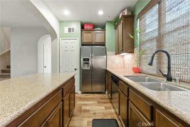 Tastefully upgraded 3-bedroom, 2.5-bath end-unit townhome on Glen Ivy Golf Club in California - for sale on GolfHomes.com, golf home, golf lot
