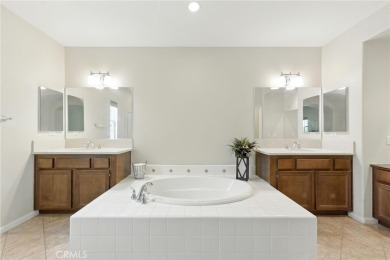 Tastefully upgraded 3-bedroom, 2.5-bath end-unit townhome on Glen Ivy Golf Club in California - for sale on GolfHomes.com, golf home, golf lot