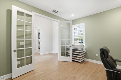 Experience Florida living in this meticulously upgraded estate on River Hall Country Club in Florida - for sale on GolfHomes.com, golf home, golf lot