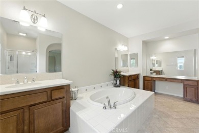 Tastefully upgraded 3-bedroom, 2.5-bath end-unit townhome on Glen Ivy Golf Club in California - for sale on GolfHomes.com, golf home, golf lot