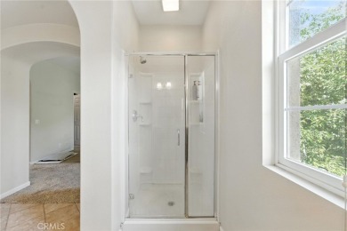 Tastefully upgraded 3-bedroom, 2.5-bath end-unit townhome on Glen Ivy Golf Club in California - for sale on GolfHomes.com, golf home, golf lot