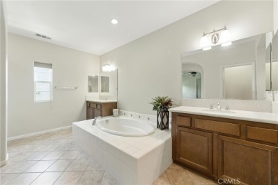 Tastefully upgraded 3-bedroom, 2.5-bath end-unit townhome on Glen Ivy Golf Club in California - for sale on GolfHomes.com, golf home, golf lot