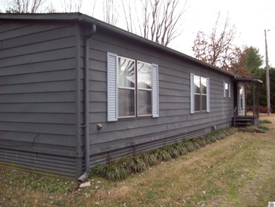 Nice 3 bedroom 2 bath home with .80 acre lot just outside the on Country Club of Paducah in Kentucky - for sale on GolfHomes.com, golf home, golf lot