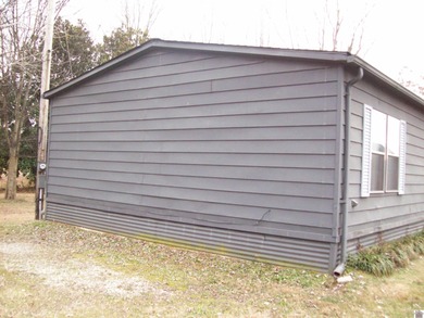 Nice 3 bedroom 2 bath home with .80 acre lot just outside the on Country Club of Paducah in Kentucky - for sale on GolfHomes.com, golf home, golf lot