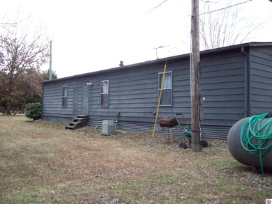 Nice 3 bedroom 2 bath home with .80 acre lot just outside the on Country Club of Paducah in Kentucky - for sale on GolfHomes.com, golf home, golf lot