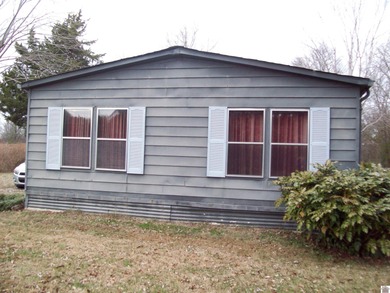 Nice 3 bedroom 2 bath home with .80 acre lot just outside the on Country Club of Paducah in Kentucky - for sale on GolfHomes.com, golf home, golf lot