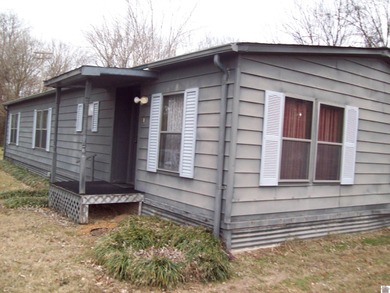 Nice 3 bedroom 2 bath home with .80 acre lot just outside the on Country Club of Paducah in Kentucky - for sale on GolfHomes.com, golf home, golf lot