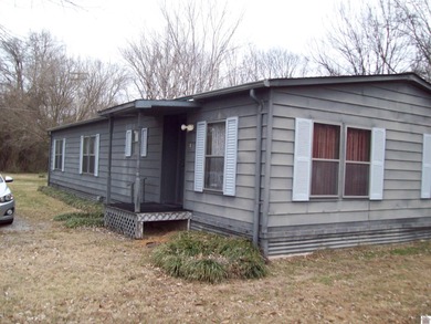 Nice 3 bedroom 2 bath home with .80 acre lot just outside the on Country Club of Paducah in Kentucky - for sale on GolfHomes.com, golf home, golf lot