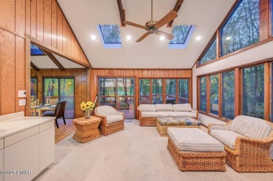 Contemporary Home with Spectacular Lake & Golf Course on Lords Valley Country Club, Inc in Pennsylvania - for sale on GolfHomes.com, golf home, golf lot