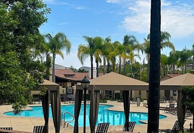 Tastefully upgraded 3-bedroom, 2.5-bath end-unit townhome on Glen Ivy Golf Club in California - for sale on GolfHomes.com, golf home, golf lot