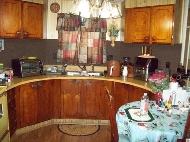 Nice 3 bedroom 2 bath home with .80 acre lot just outside the on Country Club of Paducah in Kentucky - for sale on GolfHomes.com, golf home, golf lot