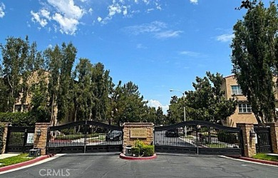 Tastefully upgraded 3-bedroom, 2.5-bath end-unit townhome on Glen Ivy Golf Club in California - for sale on GolfHomes.com, golf home, golf lot