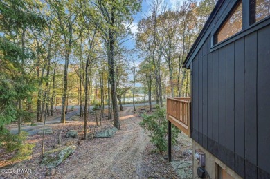 Contemporary Home with Spectacular Lake & Golf Course on Lords Valley Country Club, Inc in Pennsylvania - for sale on GolfHomes.com, golf home, golf lot