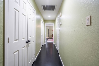 This sweet home, nestled on the 5th hole of Green Tree golf on Green Tree Country Club in Texas - for sale on GolfHomes.com, golf home, golf lot