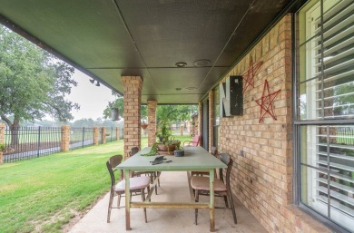 This sweet home, nestled on the 5th hole of Green Tree golf on Green Tree Country Club in Texas - for sale on GolfHomes.com, golf home, golf lot
