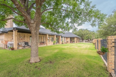 This sweet home, nestled on the 5th hole of Green Tree golf on Green Tree Country Club in Texas - for sale on GolfHomes.com, golf home, golf lot