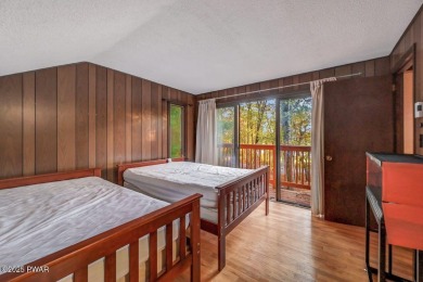 Contemporary Home with Spectacular Lake & Golf Course on Lords Valley Country Club, Inc in Pennsylvania - for sale on GolfHomes.com, golf home, golf lot
