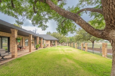 This sweet home, nestled on the 5th hole of Green Tree golf on Green Tree Country Club in Texas - for sale on GolfHomes.com, golf home, golf lot