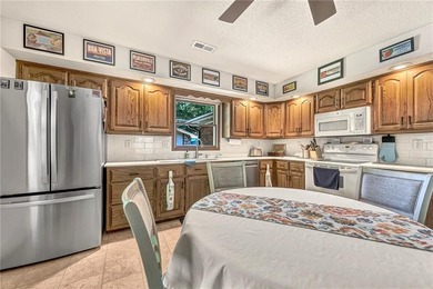 Welcome home to this custom-built property offering timeless on Bella Vista Country Club - Berksdale in Arkansas - for sale on GolfHomes.com, golf home, golf lot