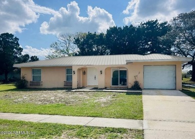 Solid concrete block 3 bedroom 2 full bath home on over 1/4 acre on St. Augustine Shores Golf Club in Florida - for sale on GolfHomes.com, golf home, golf lot