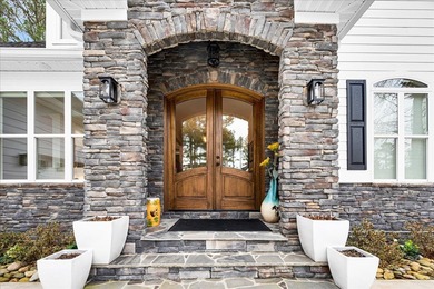 Live the coveted lake-and-golf lifestyle at Grand Harbor, a on The Patriot Golf Club At Grand Harbor in South Carolina - for sale on GolfHomes.com, golf home, golf lot