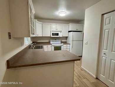 Solid concrete block 3 bedroom 2 full bath home on over 1/4 acre on St. Augustine Shores Golf Club in Florida - for sale on GolfHomes.com, golf home, golf lot