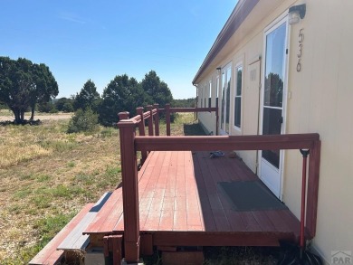 Here's a true beauty of a home nestled in the heart of Southern on Walsenburg Golf Club in Colorado - for sale on GolfHomes.com, golf home, golf lot