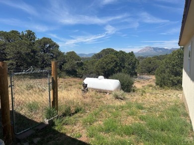 Here's a true beauty of a home nestled in the heart of Southern on Walsenburg Golf Club in Colorado - for sale on GolfHomes.com, golf home, golf lot
