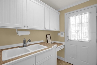 Experience the pinnacle of resort-style living in the on Zellwood Station Country Club in Florida - for sale on GolfHomes.com, golf home, golf lot