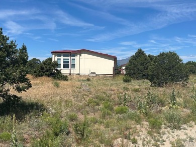Here's a true beauty of a home nestled in the heart of Southern on Walsenburg Golf Club in Colorado - for sale on GolfHomes.com, golf home, golf lot