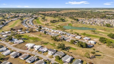 Experience the pinnacle of resort-style living in the on Zellwood Station Country Club in Florida - for sale on GolfHomes.com, golf home, golf lot