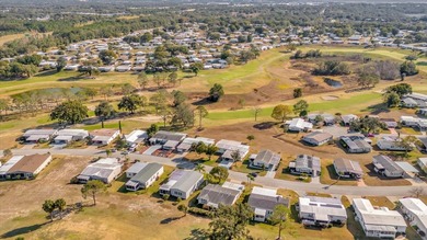 Experience the pinnacle of resort-style living in the on Zellwood Station Country Club in Florida - for sale on GolfHomes.com, golf home, golf lot