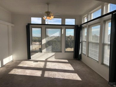 Here's a true beauty of a home nestled in the heart of Southern on Walsenburg Golf Club in Colorado - for sale on GolfHomes.com, golf home, golf lot