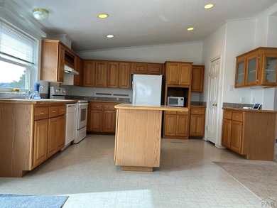 Here's a true beauty of a home nestled in the heart of Southern on Walsenburg Golf Club in Colorado - for sale on GolfHomes.com, golf home, golf lot