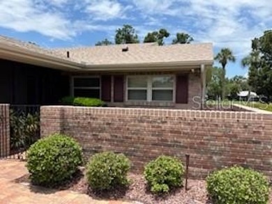 Updated and beautifully maintained 2bd/2bath plus Bonus Room on Cypresswood Golf and Country Club in Florida - for sale on GolfHomes.com, golf home, golf lot