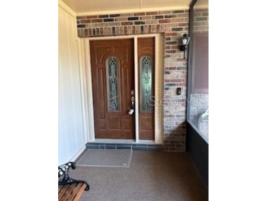 Updated and beautifully maintained 2bd/2bath plus Bonus Room on Cypresswood Golf and Country Club in Florida - for sale on GolfHomes.com, golf home, golf lot