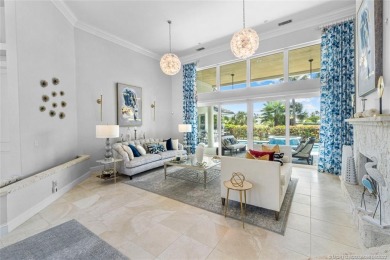 Elegantly designed 2 story home overlooking lake & fairways is on Sailfish Point Golf Club, Inc. in Florida - for sale on GolfHomes.com, golf home, golf lot