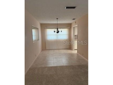 Updated and beautifully maintained 2bd/2bath plus Bonus Room on Cypresswood Golf and Country Club in Florida - for sale on GolfHomes.com, golf home, golf lot