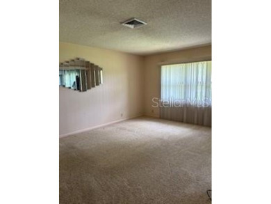 Updated and beautifully maintained 2bd/2bath plus Bonus Room on Cypresswood Golf and Country Club in Florida - for sale on GolfHomes.com, golf home, golf lot