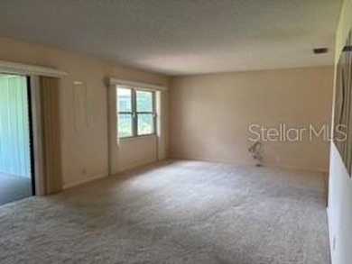 Updated and beautifully maintained 2bd/2bath plus Bonus Room on Cypresswood Golf and Country Club in Florida - for sale on GolfHomes.com, golf home, golf lot