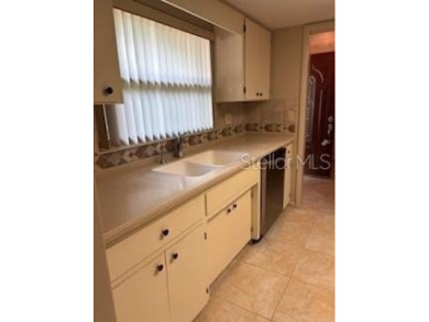 Updated and beautifully maintained 2bd/2bath plus Bonus Room on Cypresswood Golf and Country Club in Florida - for sale on GolfHomes.com, golf home, golf lot
