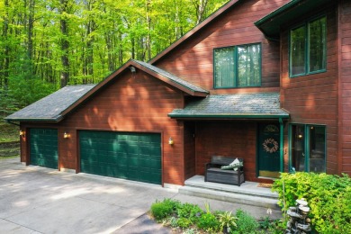 Higgins Lake Private Lake Access home -Discover the perfect on Ye Olde Country Club in Michigan - for sale on GolfHomes.com, golf home, golf lot