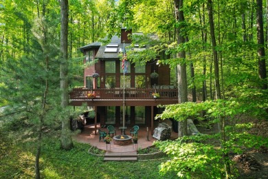 Higgins Lake Private Lake Access home -Discover the perfect on Ye Olde Country Club in Michigan - for sale on GolfHomes.com, golf home, golf lot