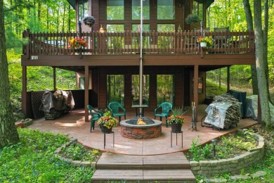 Higgins Lake Private Lake Access home -Discover the perfect on Ye Olde Country Club in Michigan - for sale on GolfHomes.com, golf home, golf lot