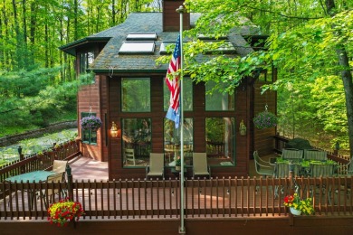 Higgins Lake Private Lake Access home -Discover the perfect on Ye Olde Country Club in Michigan - for sale on GolfHomes.com, golf home, golf lot