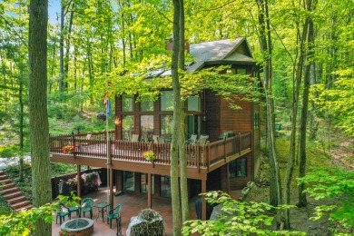 Higgins Lake Private Lake Access home -Discover the perfect on Ye Olde Country Club in Michigan - for sale on GolfHomes.com, golf home, golf lot