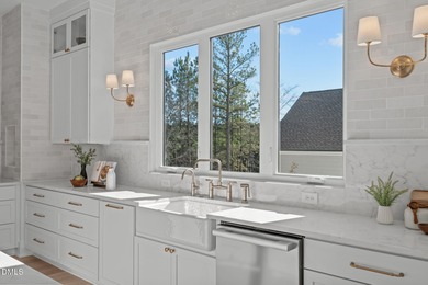 Modern Ranch Farmhouse with Golf Course Views. Built less than on Chapel Ridge Golf Club in North Carolina - for sale on GolfHomes.com, golf home, golf lot